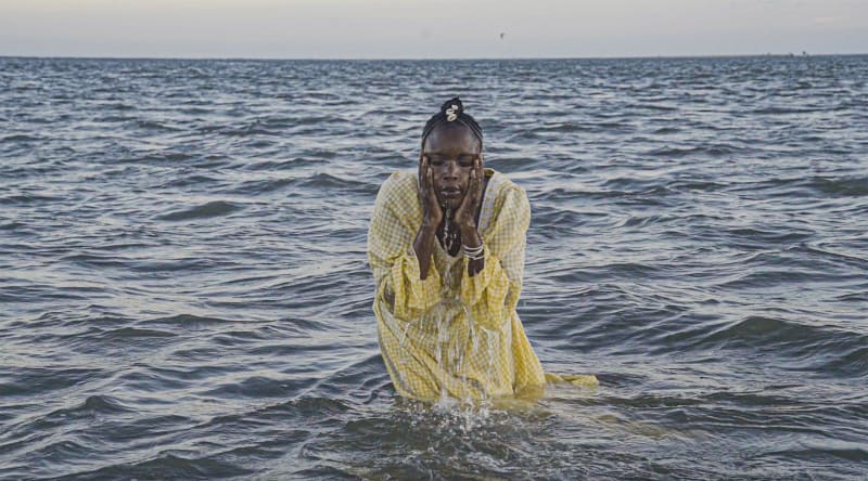 Adama Delphine Fawundu, Palii~Seat of the Ancestors and Water Spirits, 2022‑2023. Still from three‑channel video installation .