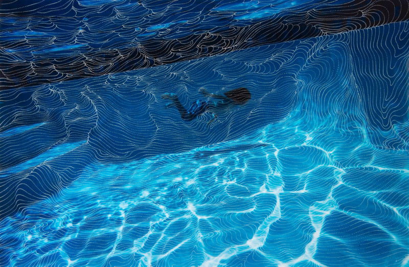 child swimming underwater