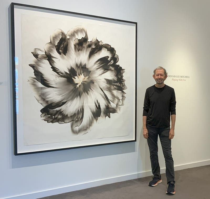 Dennis Lee Mitchell next to his epic smoke drawing, Mandala, at Jerald Melberg Gallery