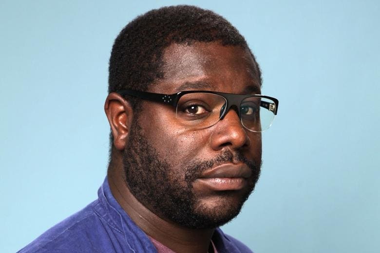 photographic portrait of person with light blue background