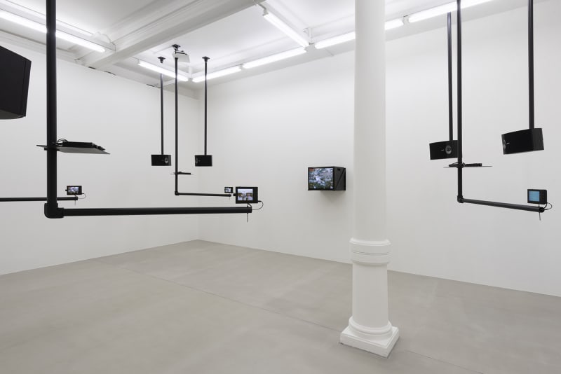 Dara Birnbaum, Tiananmen Square: Break-In Transmission, 1988-90. 5-channel color video, 4 channels stereo sound, surveillance switcher and custom-designed support switcher. Installation at Marian Goodman Gallery, London.
