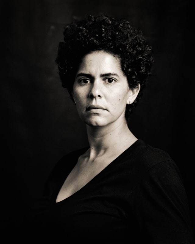 A black-and-white portrait of Julie Mehretu