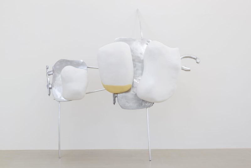Headgear by Nairy Baghramian, a suspended sculpture made of polished stainless steel and aluminum