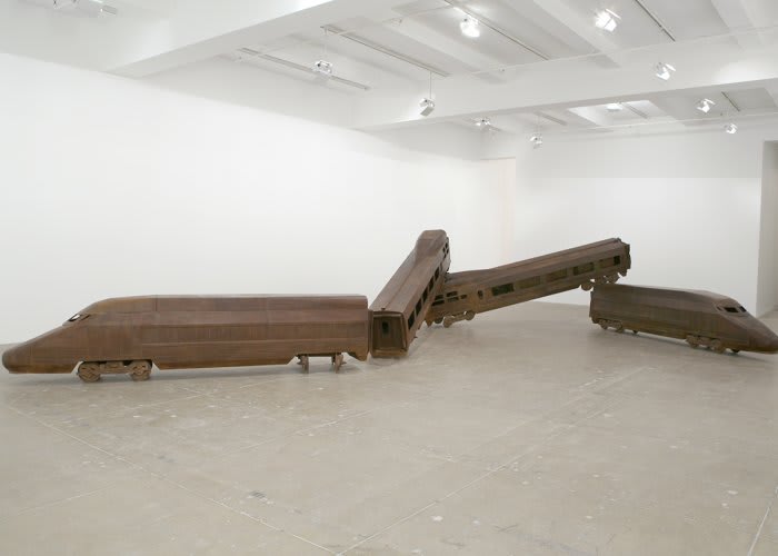 Installation of deconstructed compartments of a train. Metal unpainted.