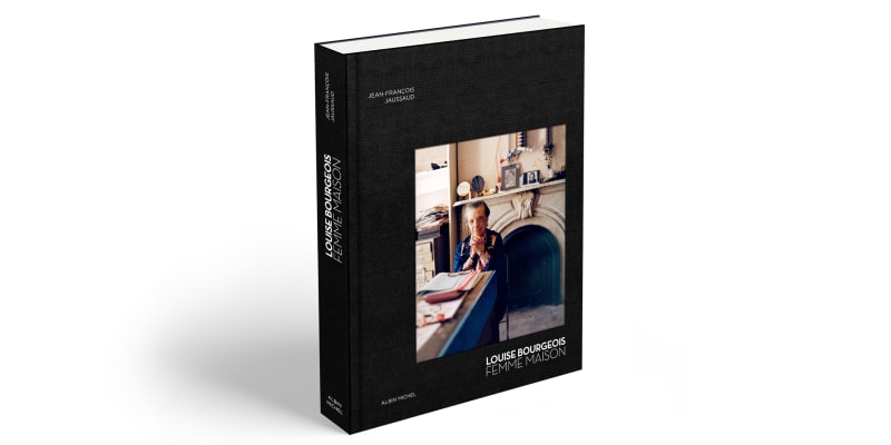 Catalogue depicting a photograph of Louis Bourgeois seated in studio, titled Louis Bourgeois Femme Maison.