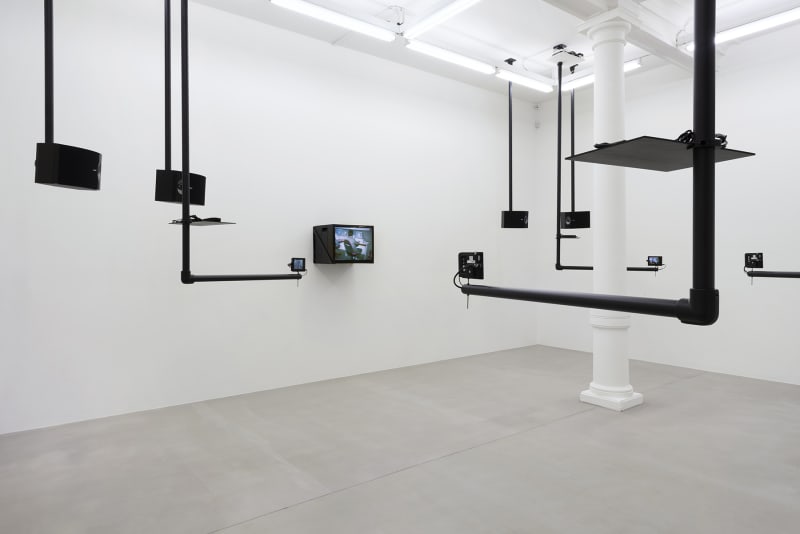 Dara Birnbaum Tiananmen Square: Break-In Transmission, 1990 5 channel color video, 4 channels of stereo sound, surveillance switcher and custom-designed support system