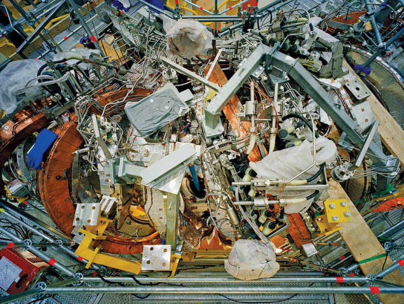 A photograph taken inside a nuclear facility, containing a mix of metal and wire, by Thomas Struth