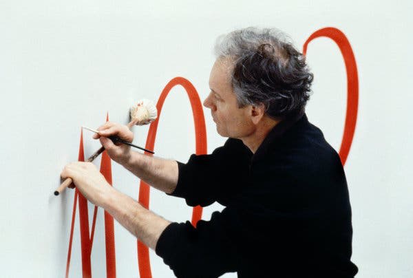 Lothar Baumgarten paints in studio, side view