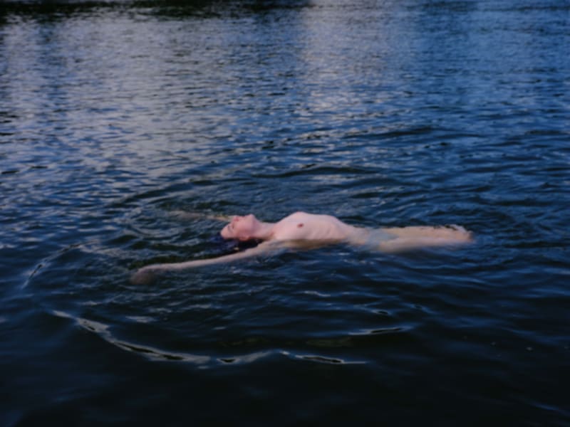 Nan Goldin, "Thora Floating, Connecticut," 2020. Archival pigment print