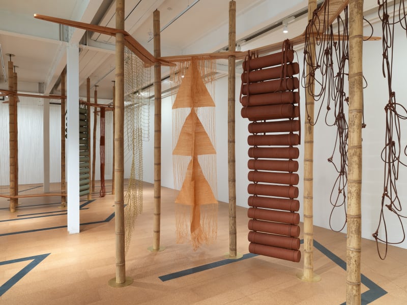 Leonor Antunes, The homemaker and her domain II, 2022, bamboo, brass fixtures, cherry wooden shelves, rope, brass,