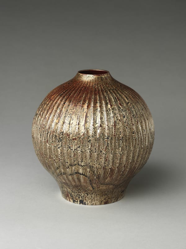 Tamagawa Norio (Japanese, born 1942). Wood-Grain Metal Vase. 2019. Heisei period (1989–2019). Hammered silver, copper, and copper and gold alloy (shakudō). H. 8 1/2 in. (21.6 cm); Diam. 8 1/4 in. ( 21 cm). The Metropolitan Museum of Art, Gift of Hayashi Kaoru, in celebration of the Museum’s 150th Anniversary, 2020 (2020.390.3). Image © Tamagawa Norio