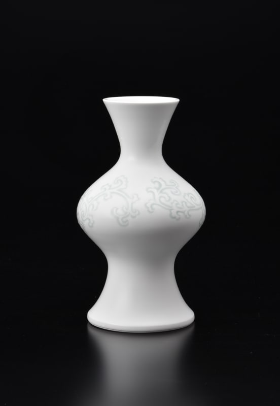 INOUE MANJI, Engraved Hakuji (white porcelain) MidoriKarakusa (green arabesque) Patterned Vase, 2019 Porcelainh.11 3/4 x 6 3/4 in. (30.2 x 17.5 cm)