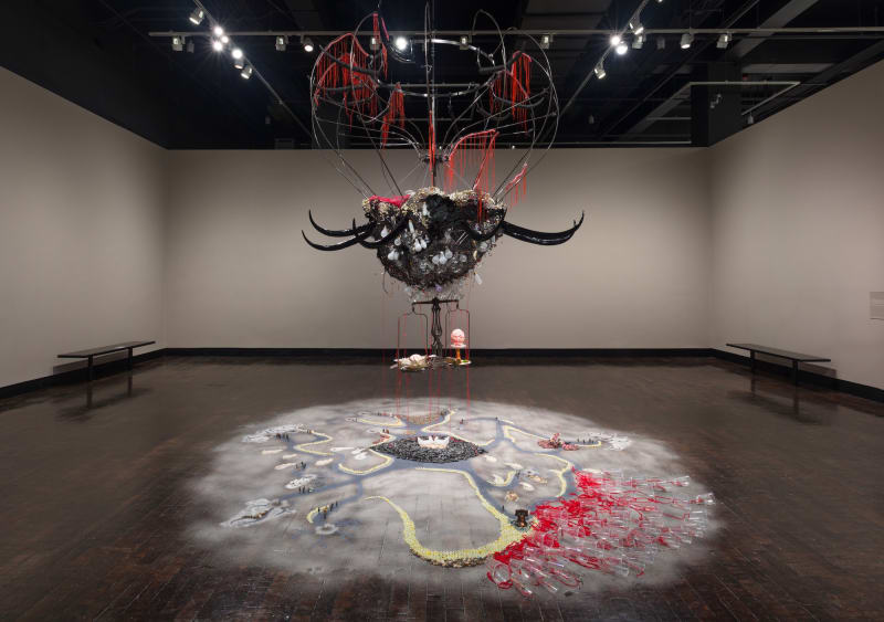 Rina Banerjee, World Lost, 2013, Resin horns, cotton thread, light bulbs, wire net, sand, fake fur, steel scale, 213.36 x 152.4 x 304.8 cm