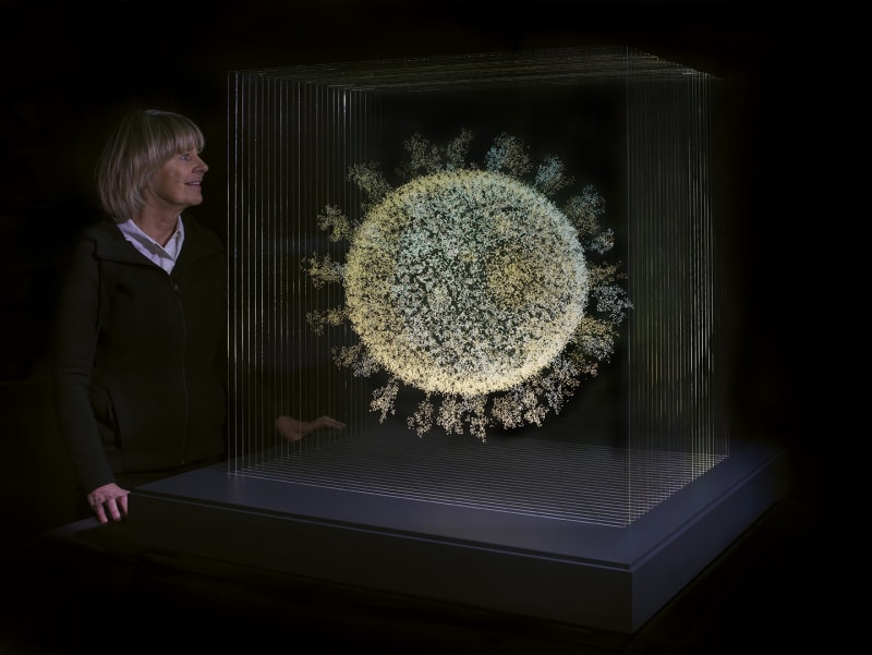 Angela Palmer with her work '2020: The Sphere that Changed the World (Coronavirus)', 2021