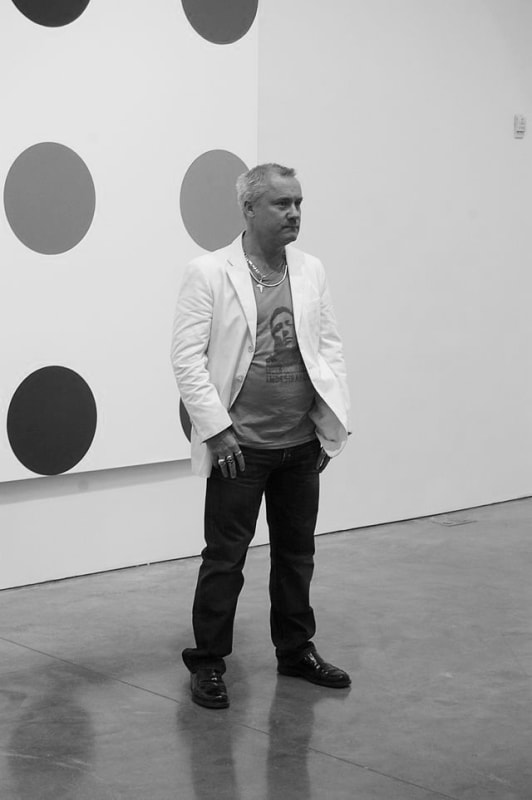 Damien Hirst at the exihibition Damien Hirst The Complete Spot Paintings 1986-2011, Gagosian Gallery, NYC