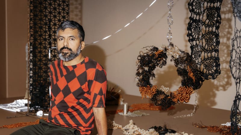 ektor garcia preparing for his exhibition, "ektor garcia: loose ends," at the San José Museum of Art. Photo: Rachael Wright