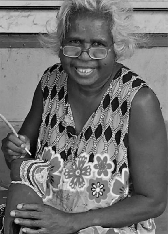 A black and white photo of Aboriginal-Australian artist Judy Manany.