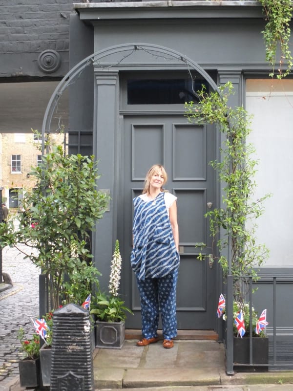 Rebecca Hossack outside her house