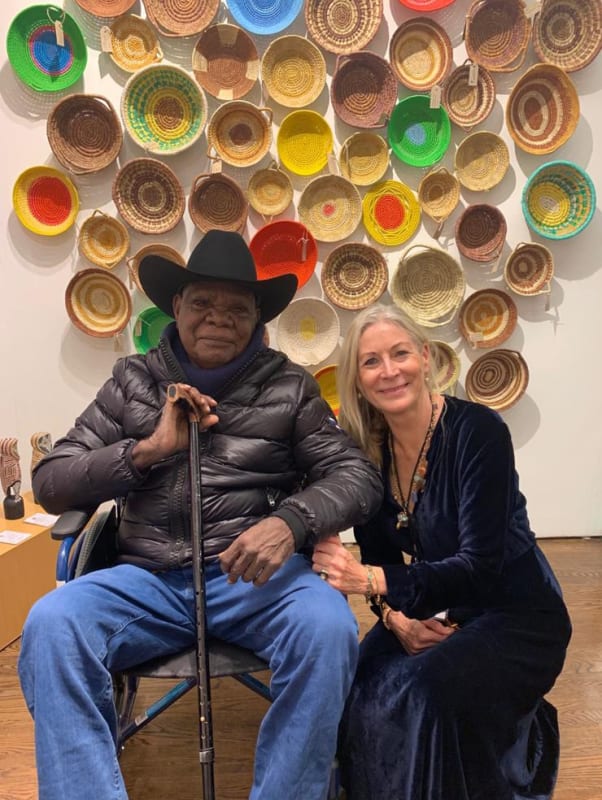 Rebecca Hossack and Aboriginal Fitzroy Crossing artist, Tommy May, at Outsider Art Fair New York 2020