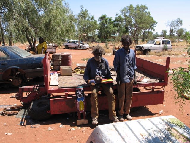 Motorbike Paddy Ngale with his son Mathew at Camel Camp, Australia in 2009