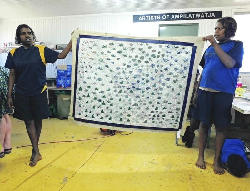 Aboriginal artists from Ampilatwatja, Australia during a visit from Rebecca Hossack