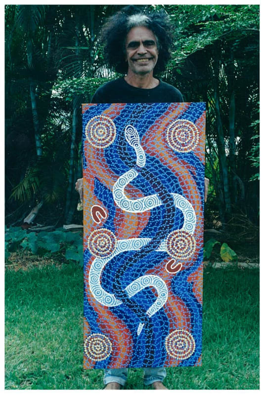 Malcolm Jagamarra Nelson with his painting for the Rebecca Hossack Art Gallery