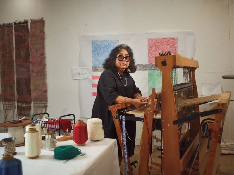 Consuelo Jimenez Underwood sewing in her studio in Gualala, California