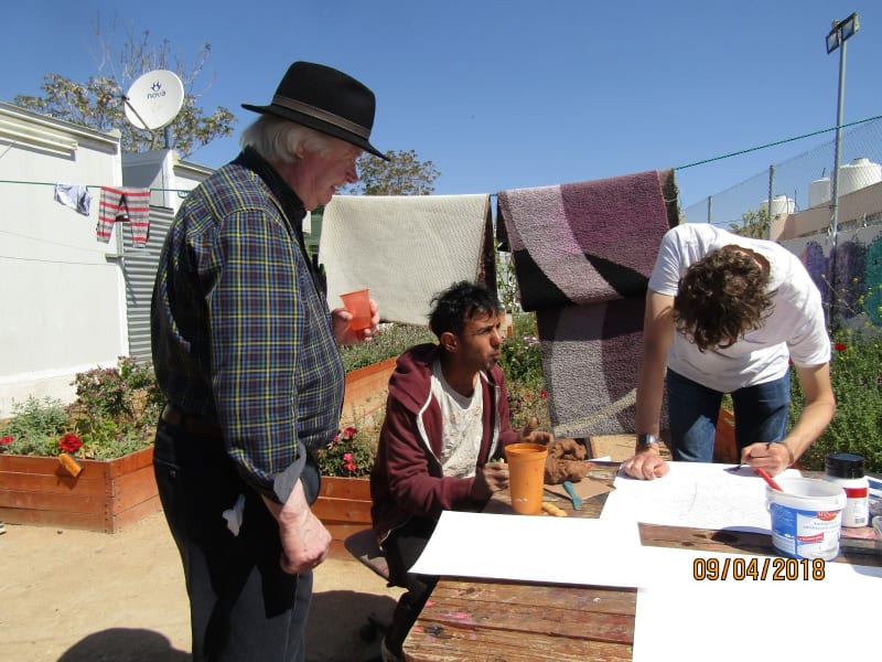 John Behan working with refugees at Eleonas camp in Athens during an earlier visit this year.