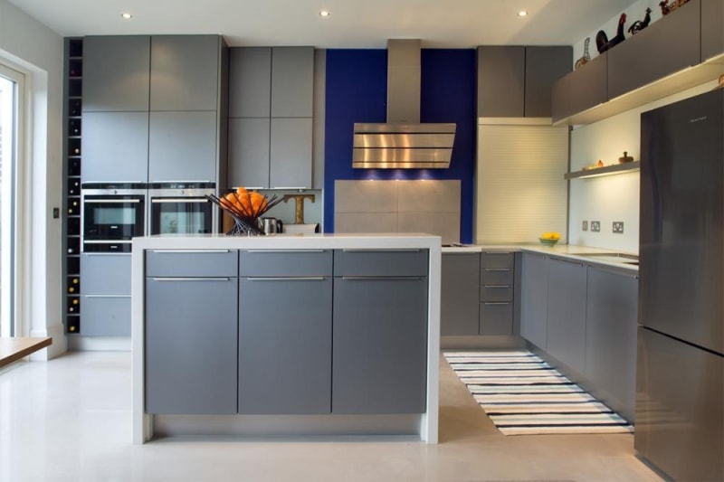 The grey kitchen units are from Kube Kitchens. Each object in the house was carefully picked, such as the tap which cost €1,000. 'When everyone else was having fun, we were in industrial estates looking at a tap,' John says with a laugh, adding: 'I was a pest in Knobs and Knockers'