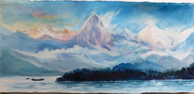 The Annapurnas from Phewa Lake at Pokhara Nepal