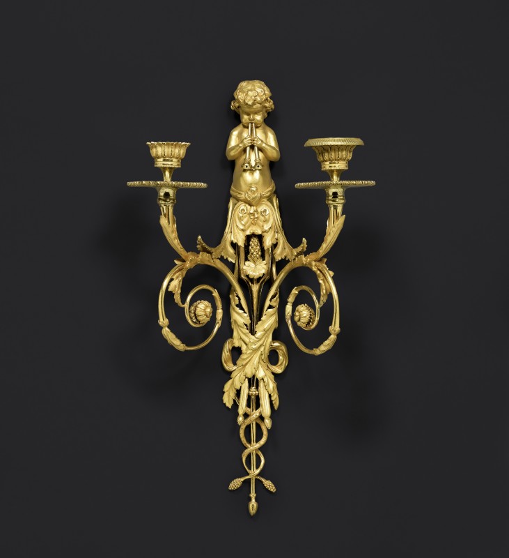 A pair of Louis XVI two-light wall-lights after a design by Jean Hauré, Paris, date circa 1787