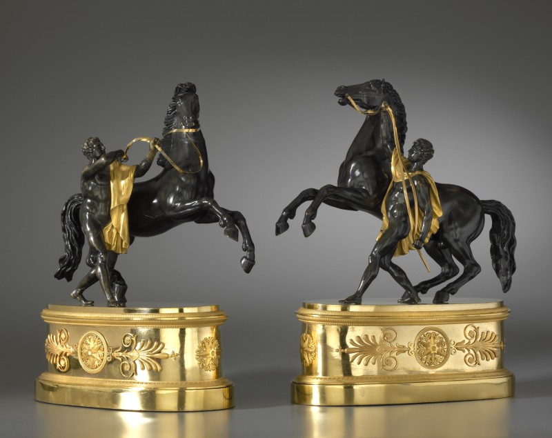 A pair of Empire statuettes based on models of the Marly Horses by Guillaume I Coustou, Paris, date circa 1810-20