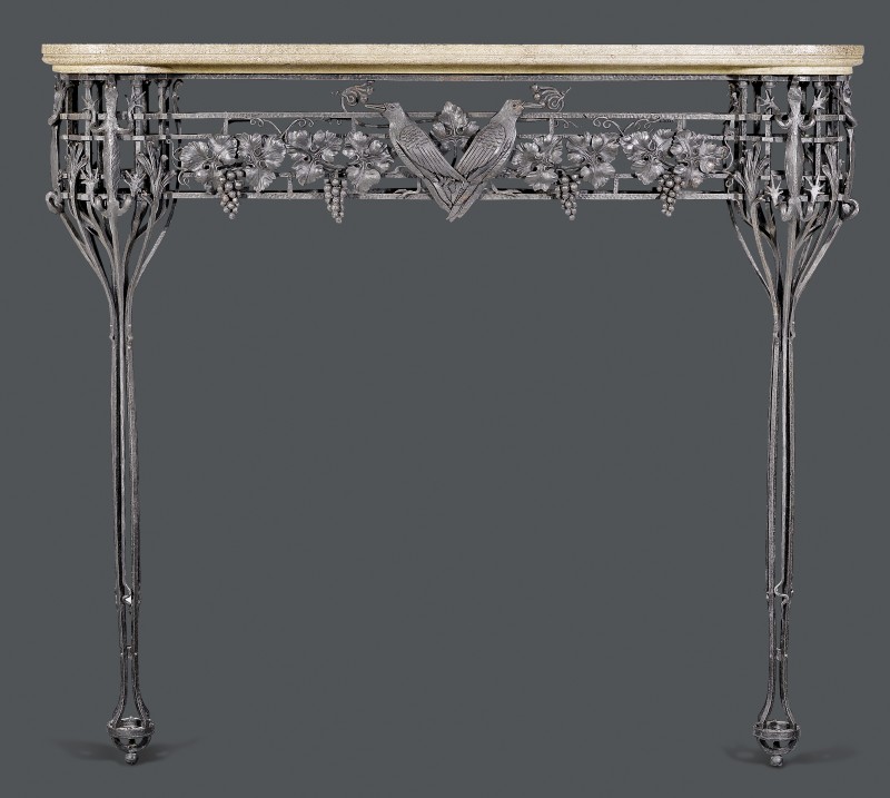 A very fine Art Deco wrought iron mantel piece with shaped, gray / beige stone plate, French, date circa 1930