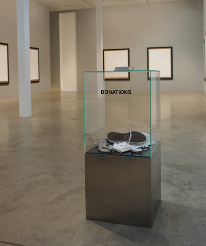 <p>Donation Box, 2006<br /><em>Glass, stainless steel, various objects, <span style="line-height: 1.5em;">105 x 44.5 x 44.5 cm </span><span style="line-height: 1.5em;">41 3/8 x 17 1/2 x 17 1/2 in</span></em></p>