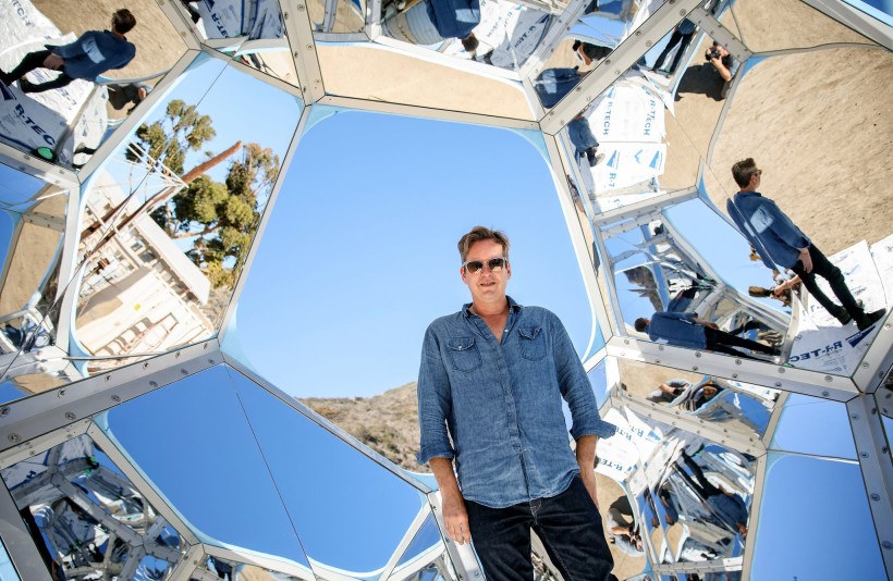  Doug Aitken inside one of his “pavilions” before it was installed underwater off Catalina Island in California. Credit Patrick T. Fallon for The New York Times 