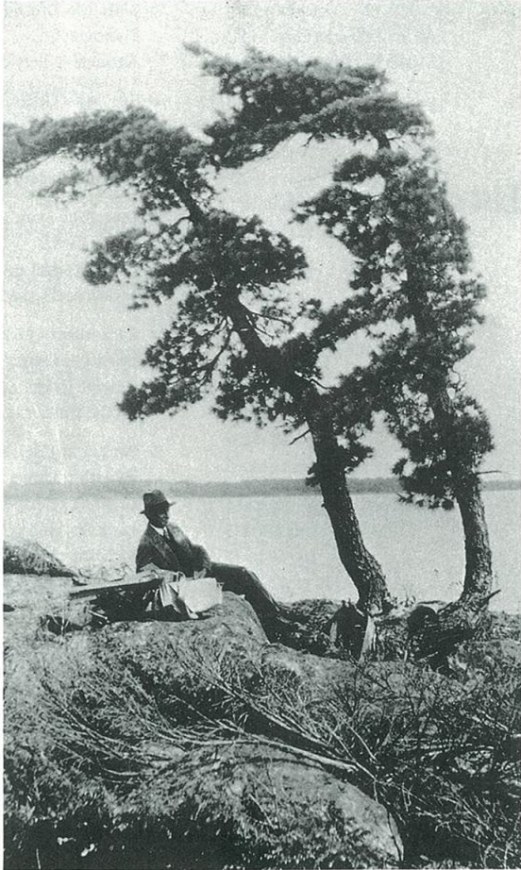 Fig. 2J.E.H. MacDonald sketching under the shade of a poplar tree during his trip to Sturgeon Bay in 1931.