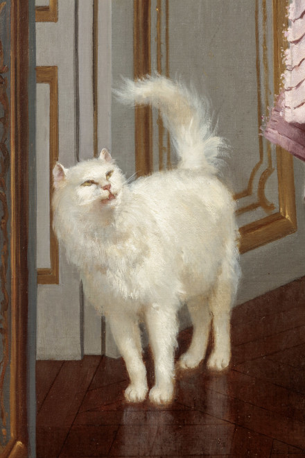 ELEGANT YOUNG WOMAN WITH TWO WHITE CATS
