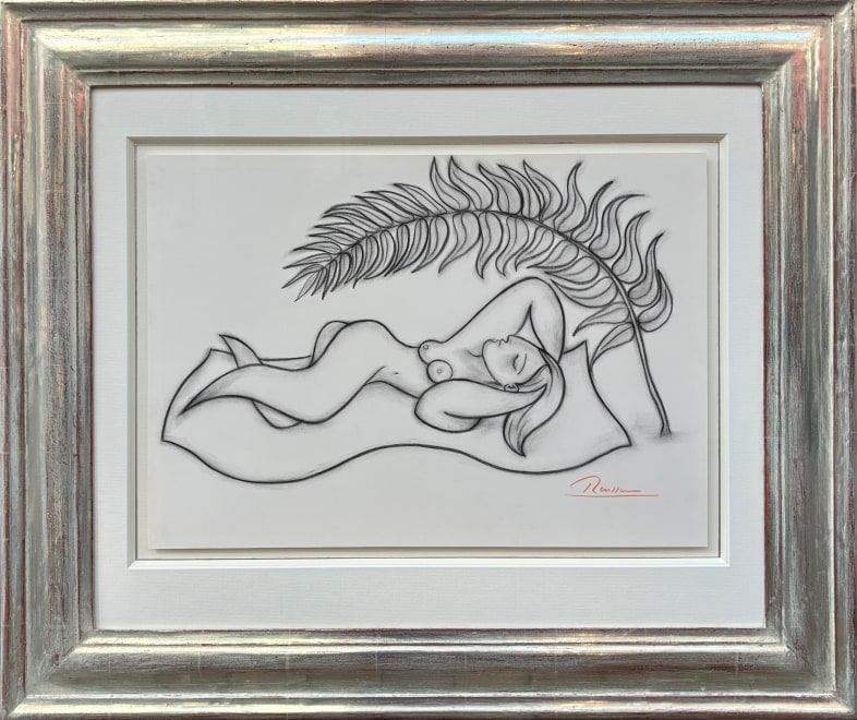 Nude under a palm leaf