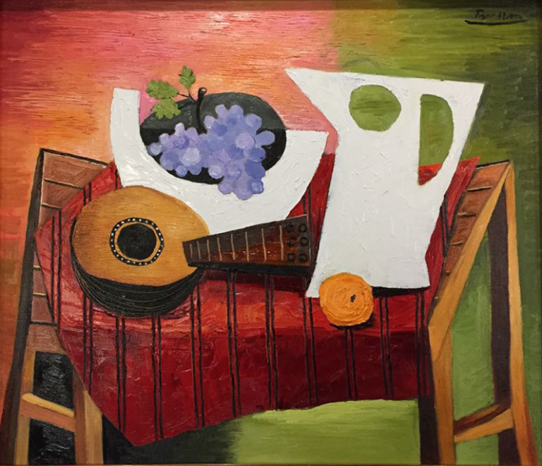 Still life with mandolin, grapes, pitcher and orange