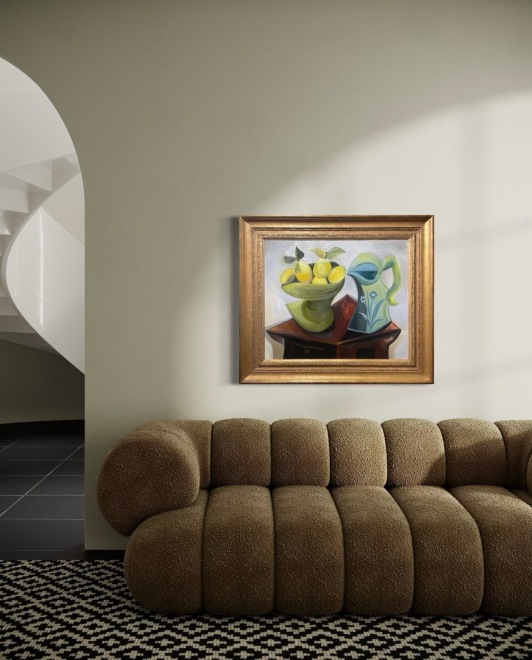 Lemons and pitcher on a table