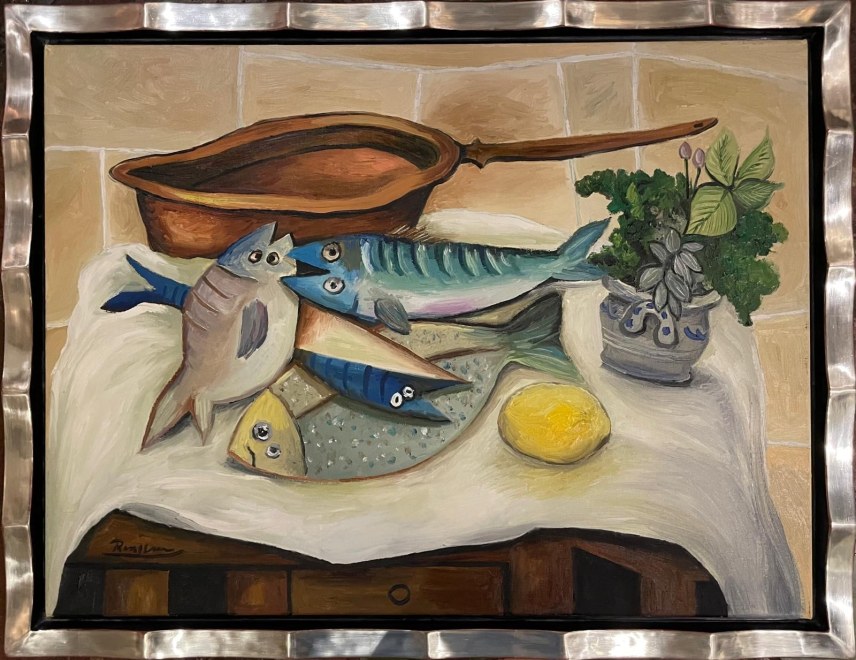 Fish, lemon, herbs & pan on a table