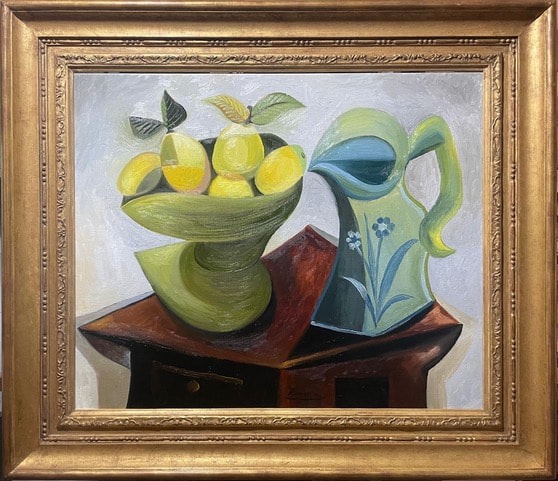 Lemons and pitcher on a table