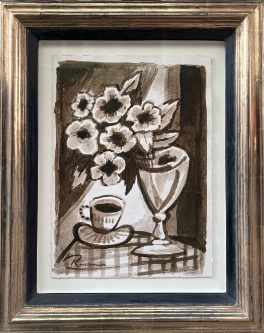 Cup and saucer with flowers in a vase