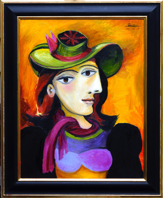 Woman in a green hat with red scarf