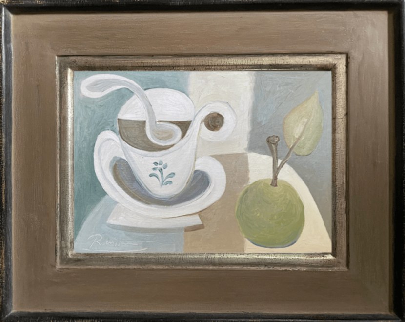 Cup and saucer with an apple