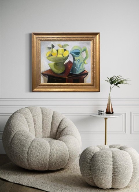 Lemons and pitcher on a table