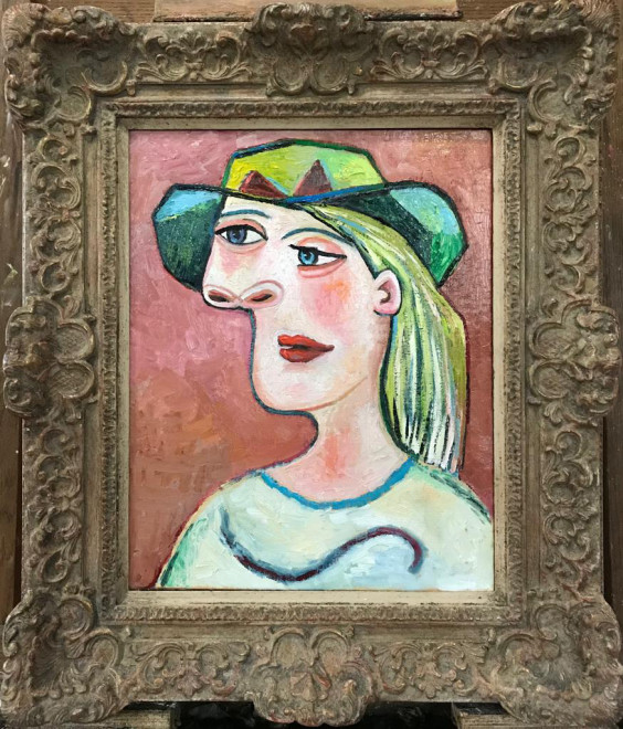 Woman in a green hat