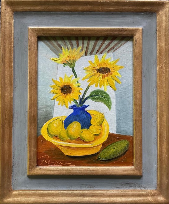Sunflowers and lemons in a bowl