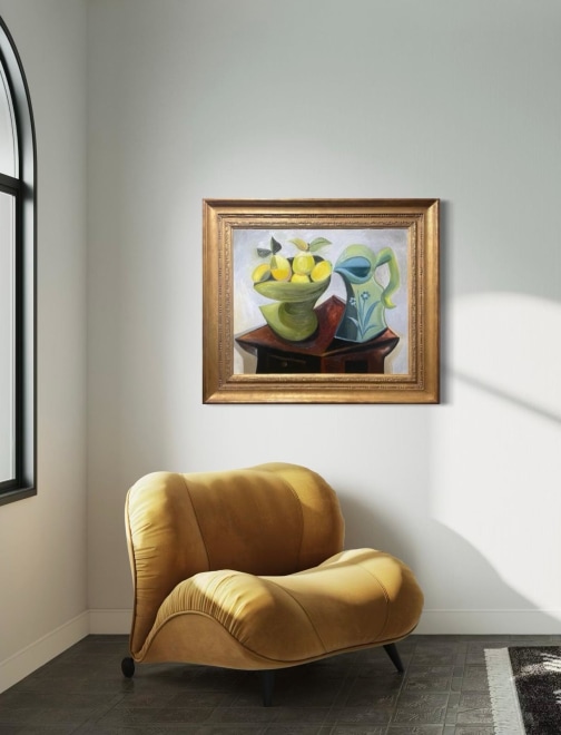 Lemons and pitcher on a table