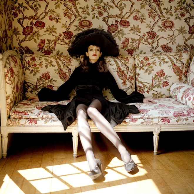 Woman on Floral Sofa, Paris, France